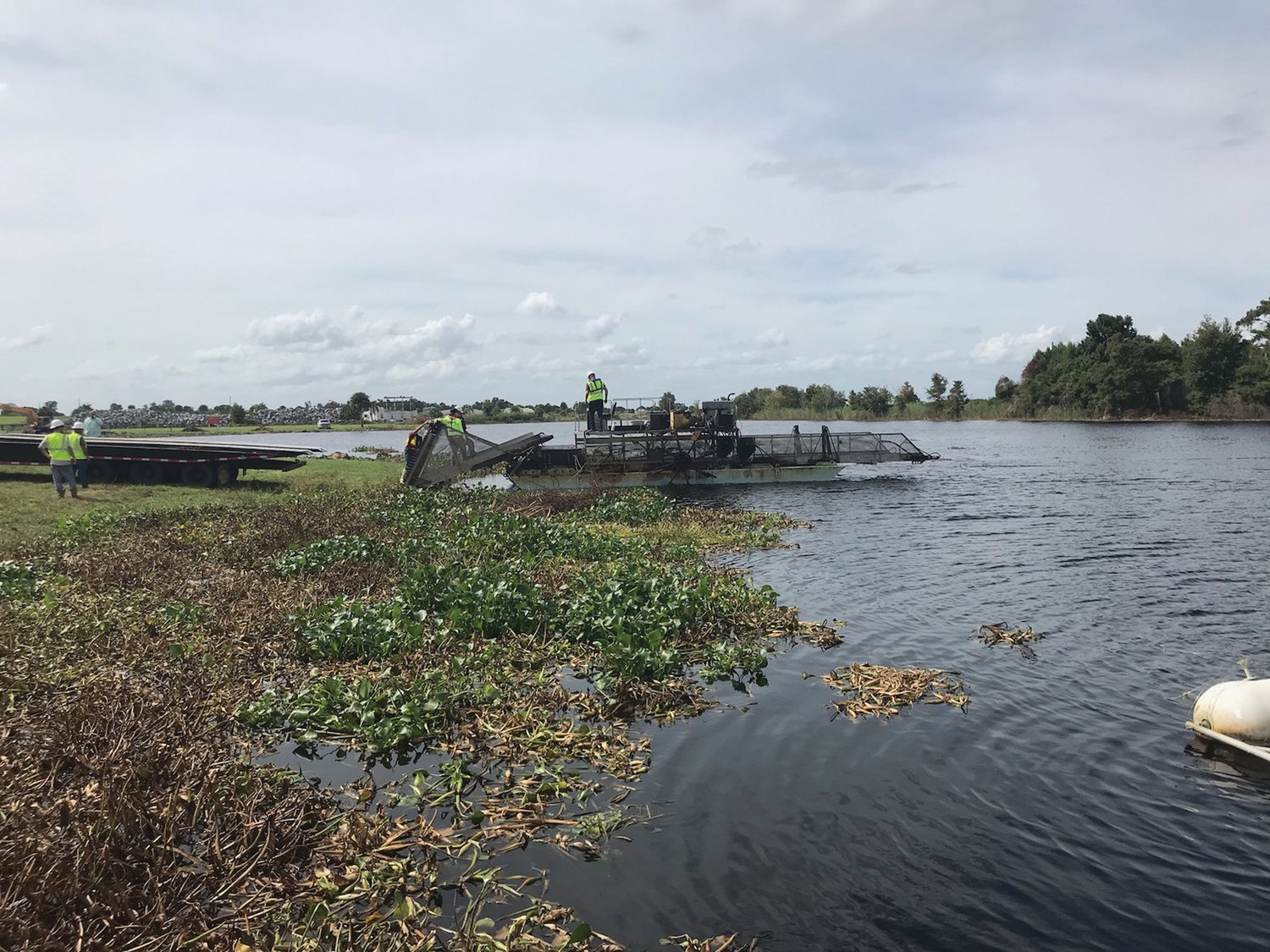 MOORE HAVEN – The U.S. Army Corps of Engineers is using mechanical harvesters and heavy equipment to clear the vegetation blocking the Lake Okeechobee Waterway at Moore Haven.